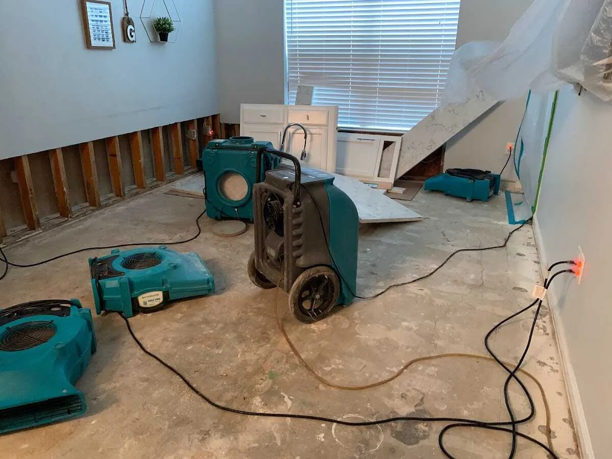 Dehumidifier in flood-cut room for Water Damage Restoration in Plumsted